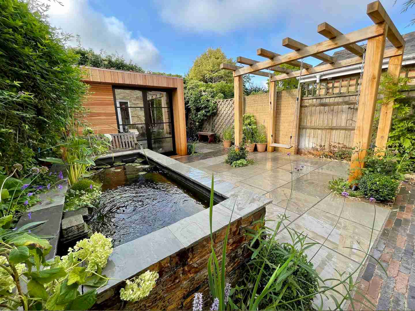 garden with fountain and garden room